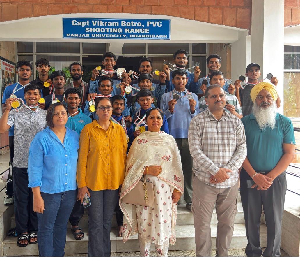 Winners of the PU Inter-College Mallakhamb Championship.